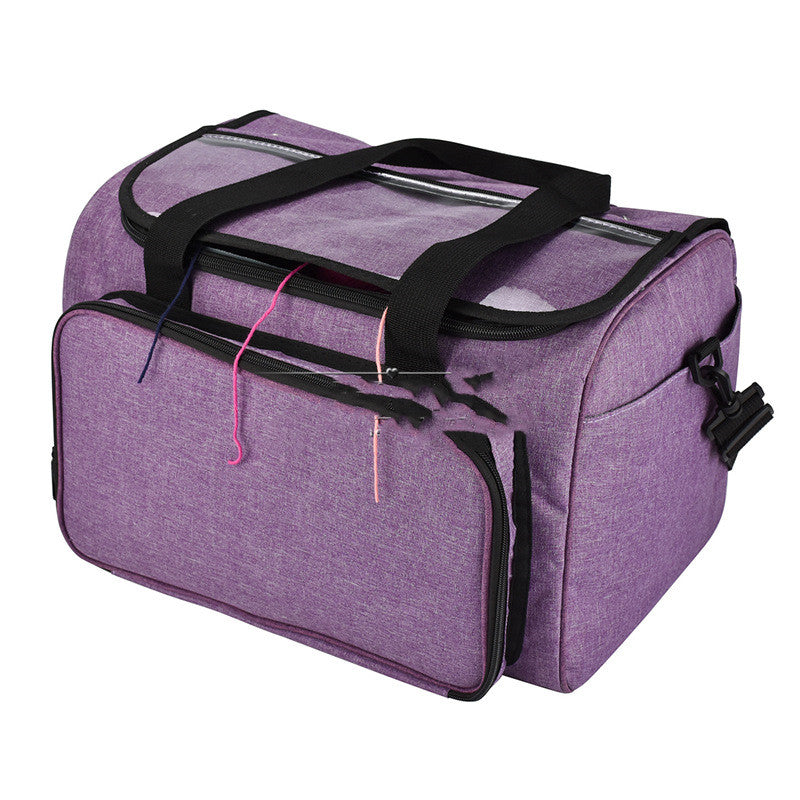 Purple yarn storage bag with carry handles and shoulder strap