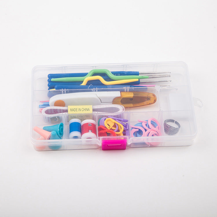 Closed clear storage box with crochet tools visible