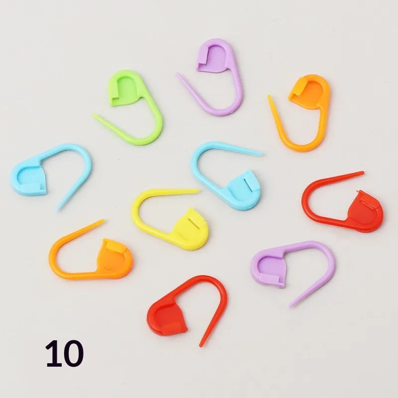 Close-up showing ten examples of the mixed-color locking stitch markers supplied in a 100-piece pack