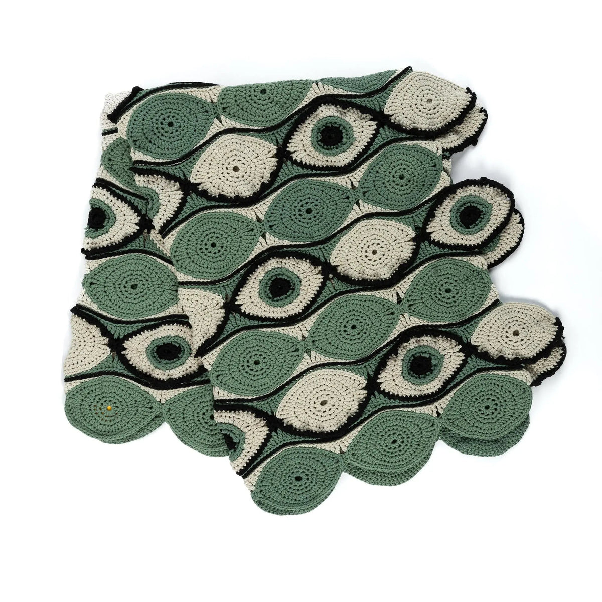 Folded eye-motif crochet blanket