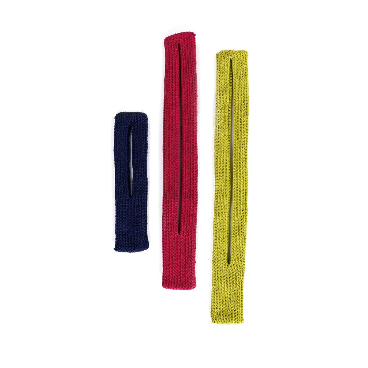 Navy, pink and yellow crochet phone pouch examples laid flat