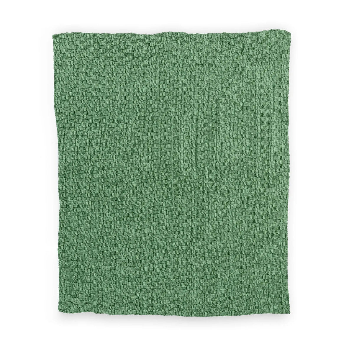 Green knitted blanket laid flat