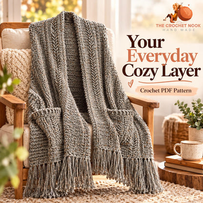 Heather Trails textured crochet pocket shawl with a long rectangular shape and fringe.