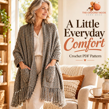 Woman wearing the Heather Trails crochet shawl with two front pockets and fringed ends.