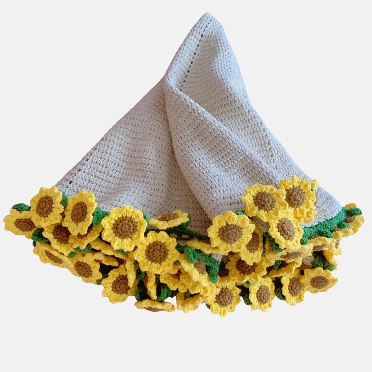 Sunflower-edged crochet blanket folded into a bouquet shape