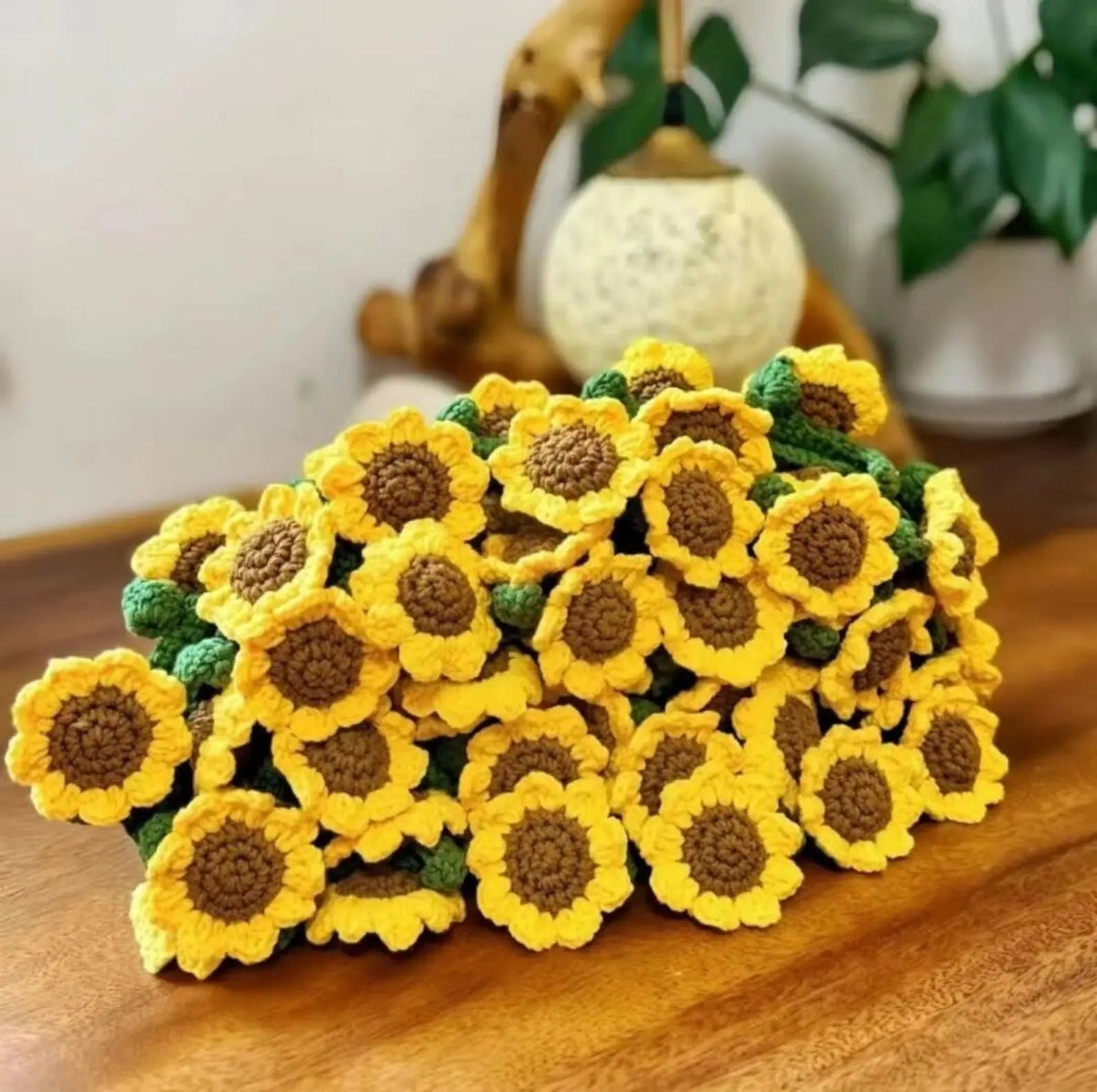 Sunflower crochet bouquet displayed on a table