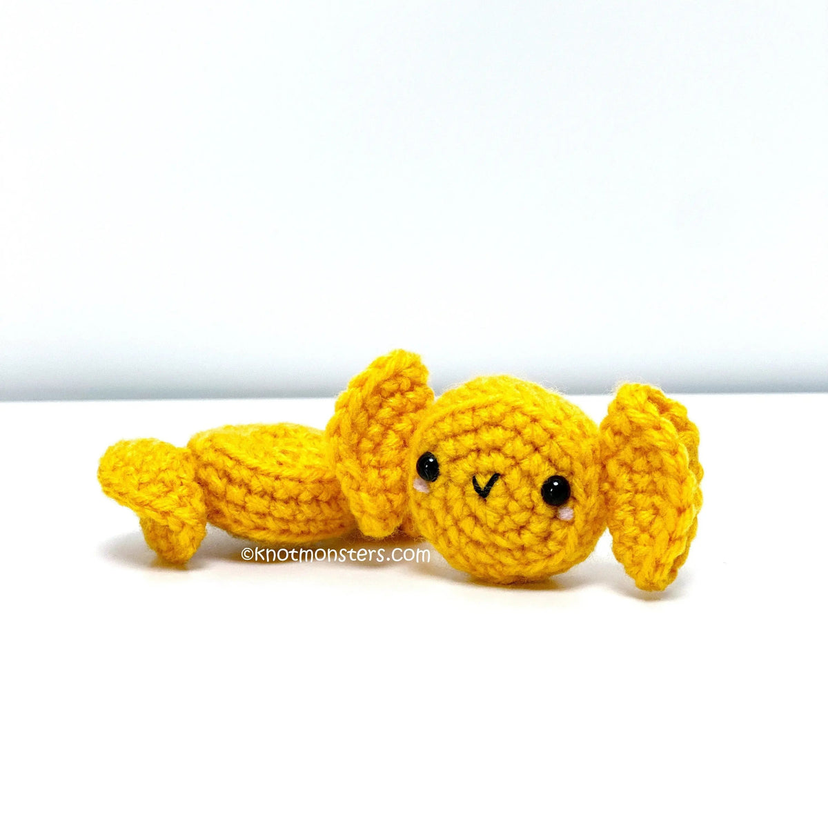 Yellow wrapped crochet candy
