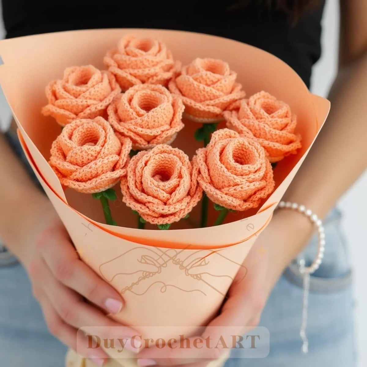 Peach crochet rose bouquet in paper wrapping